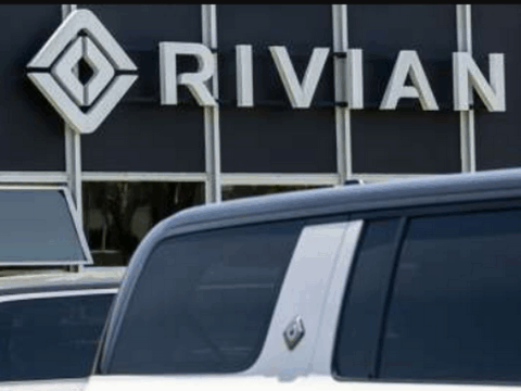 Rivian Cost Cuts Help Pare Loss