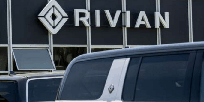 Rivian Cost Cuts Help Pare Loss